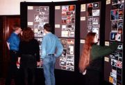 Convention-goers browse the Kraftwerk picture display